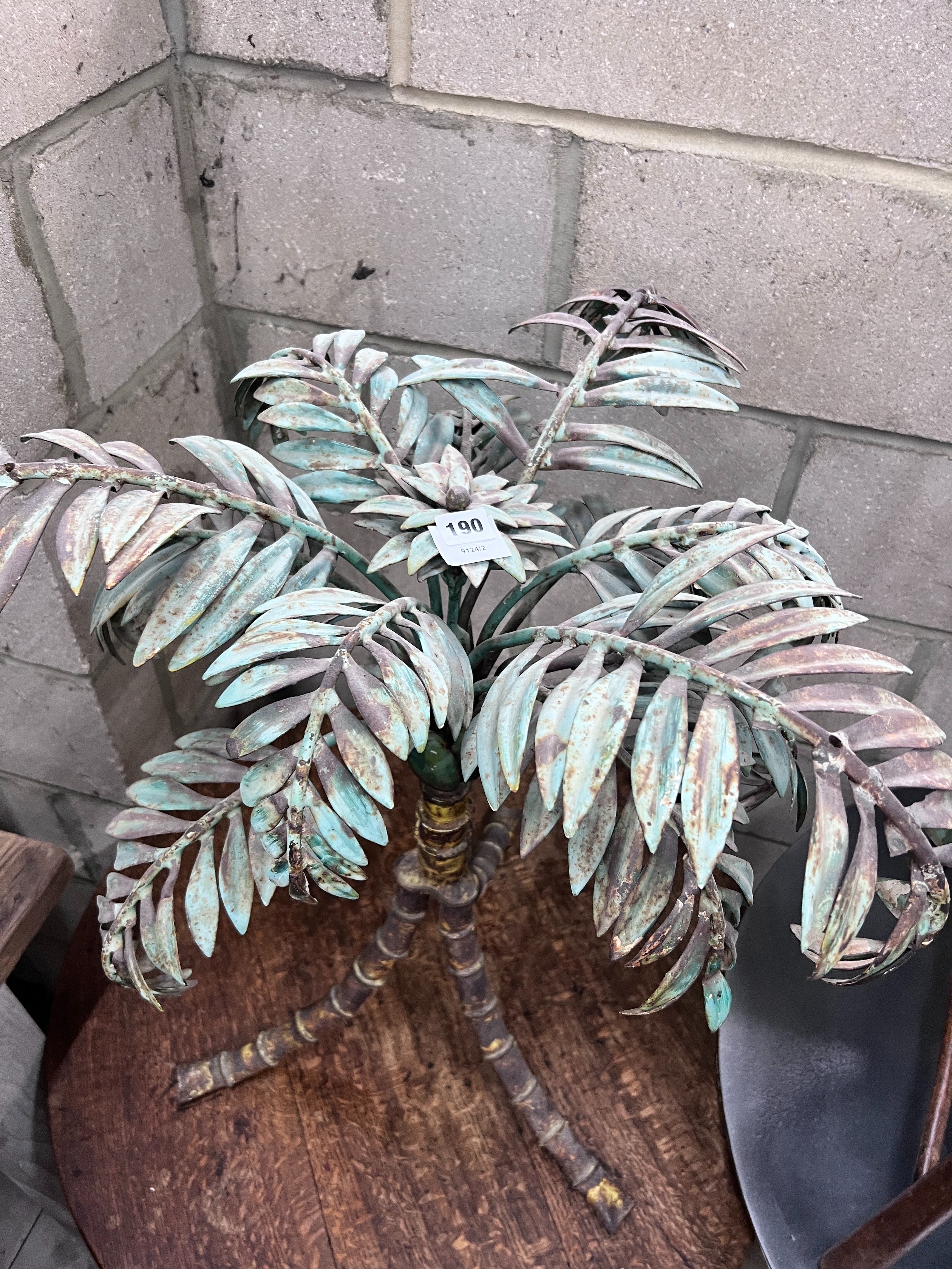 A painted wrought iron palm tree underframe, height 66cm *Please note the sale commences at 9am.